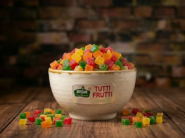 Tutti frutti colorful candied papaya cubes in zip pouch for cake and dessert topping